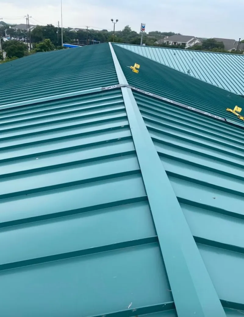 Green commercial metal roof ridge and valley for Metal Roof Repair in Belgrade