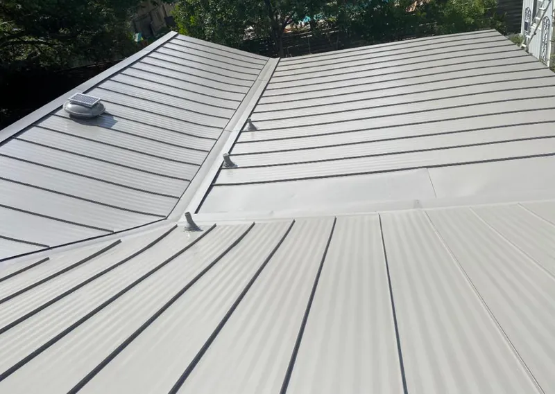 Solar attic fan installed on a metal roof for Roof Ventilation in Belgrade